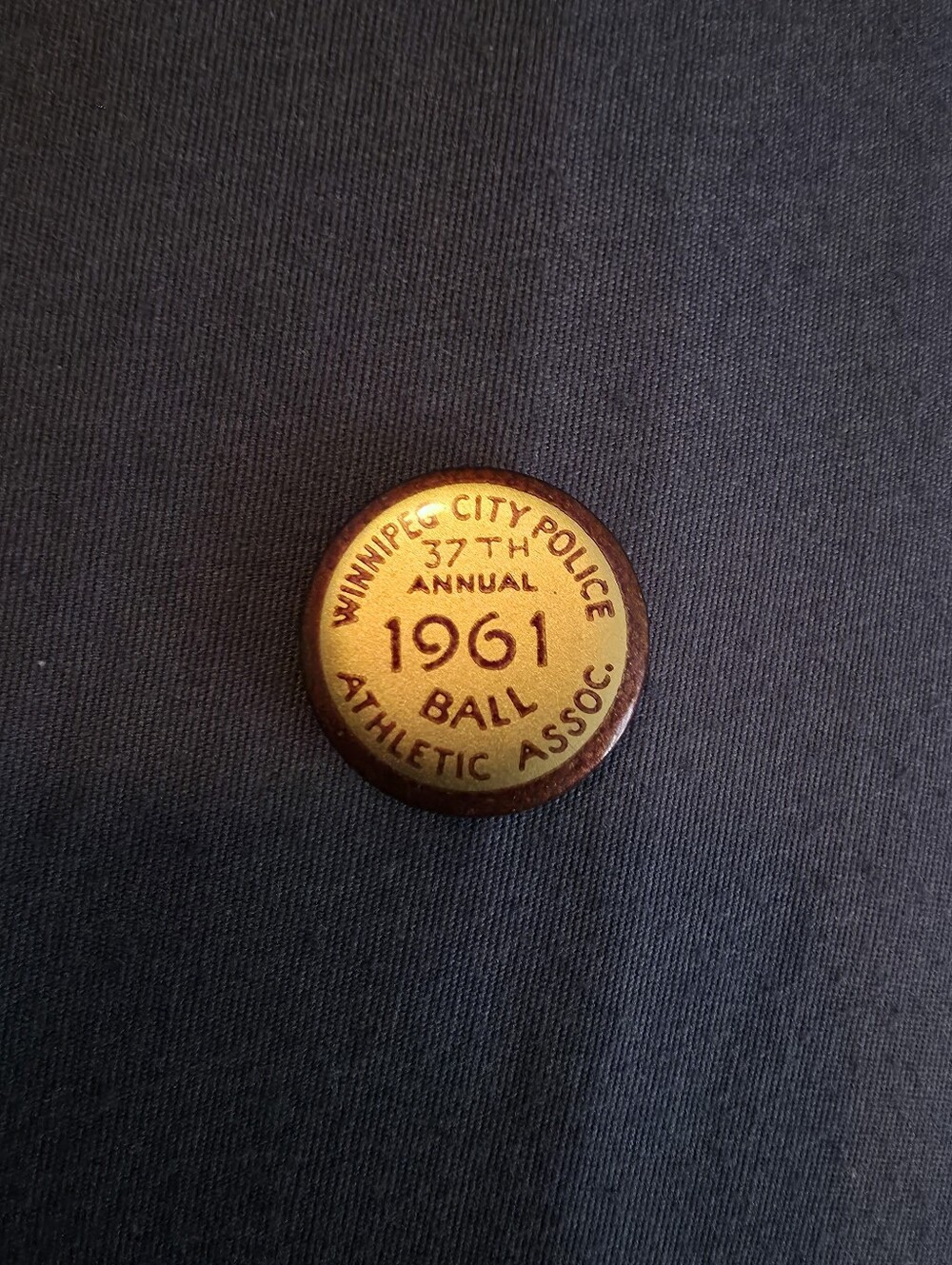 Vintage commemorative pin or token from the 37th Annual Winnipeg City Police